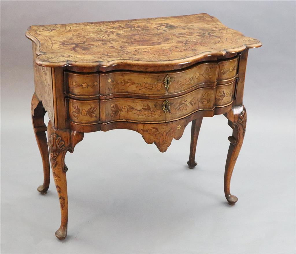 An 18th century Dutch and walnut marquetry lowboy, W.2ft 9in. D.1ft 8in. H.2ft 5in.